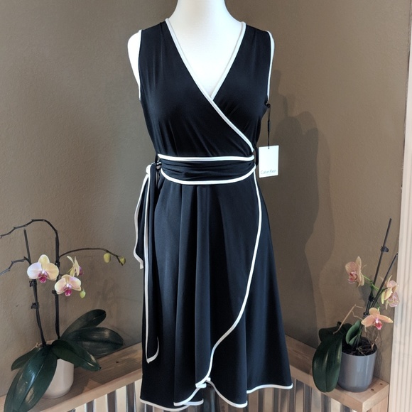 Calvin Klein Dresses & Skirts - Calvin Klein black/white wrap dress